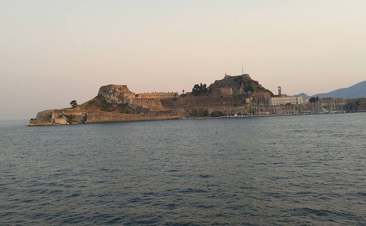 Old Fortress of Corfu seen across the water at dusk