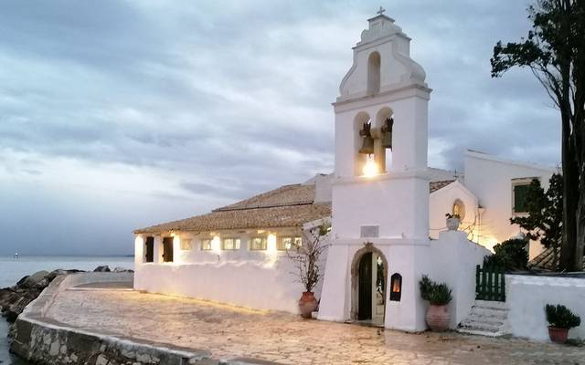 Whitewashed chapel beside the sea