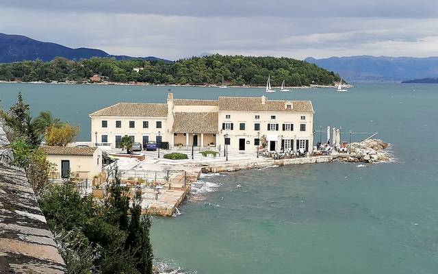 Coastal buildings on a rocky bay